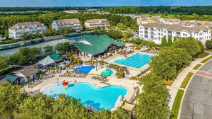 A resort with multiple swimming pools, a tennis court, and a variety of buildings. - Bayside New Listing Located on 14th Fairway (Selbyville)