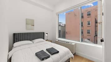 2 bedrooms, desk, iron/ironing board, travel crib