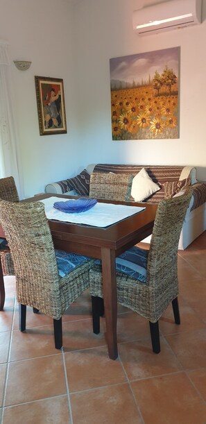 Dining - Very close to the Cinta beach house with large lawn garden. (San Teodoro)