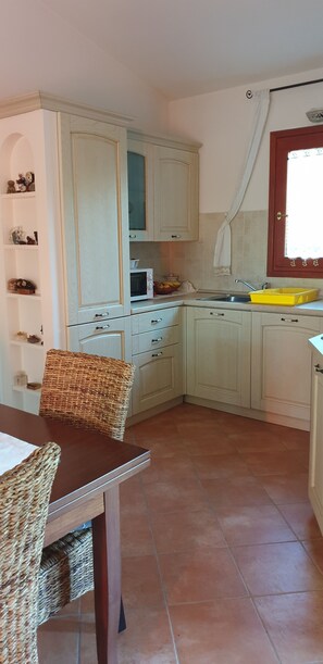 Dining - Very close to the Cinta beach house with large lawn garden. (San Teodoro)