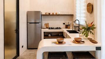 Luxury Apartment, Patio, Garden View | Private kitchen | Full-size fridge, stovetop, cookware/dishes/utensils