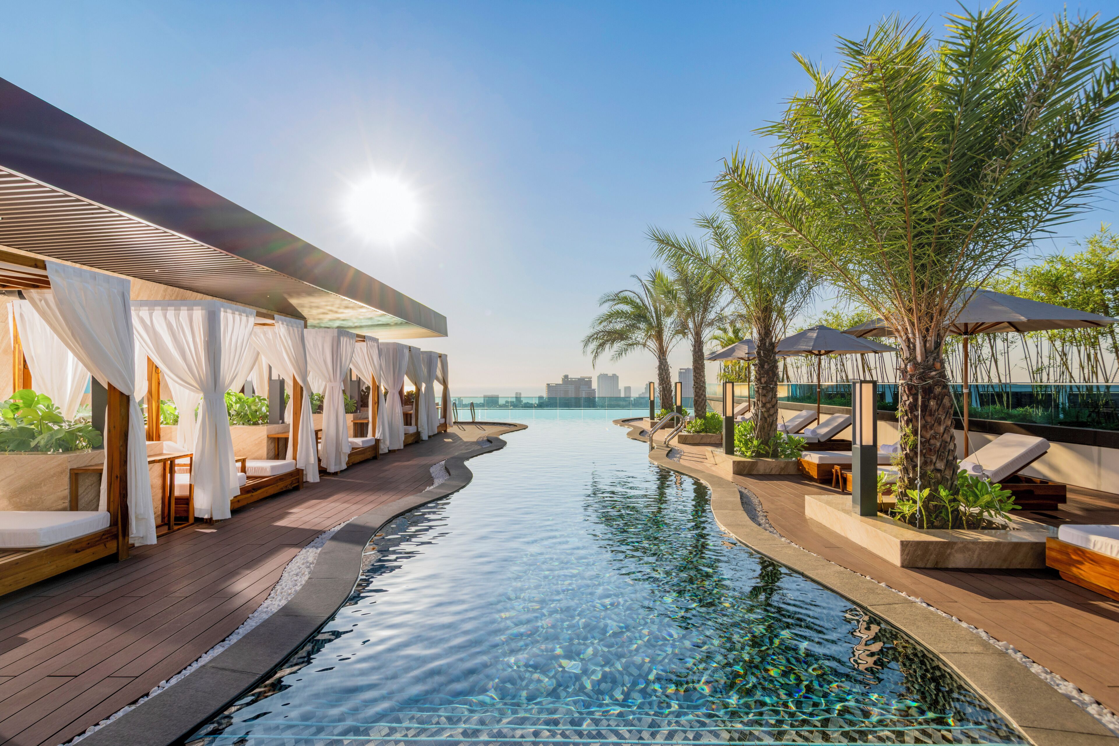 Outdoor pool, open 7:00 AM to 8:00 PM, free pool cabanas, pool umbrellas