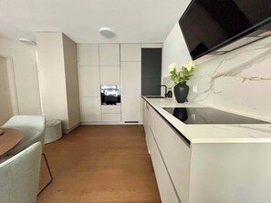 Fridge, microwave, oven, stovetop - Modern & Peaceful Renovated Apartment in Riehen (Riehen)