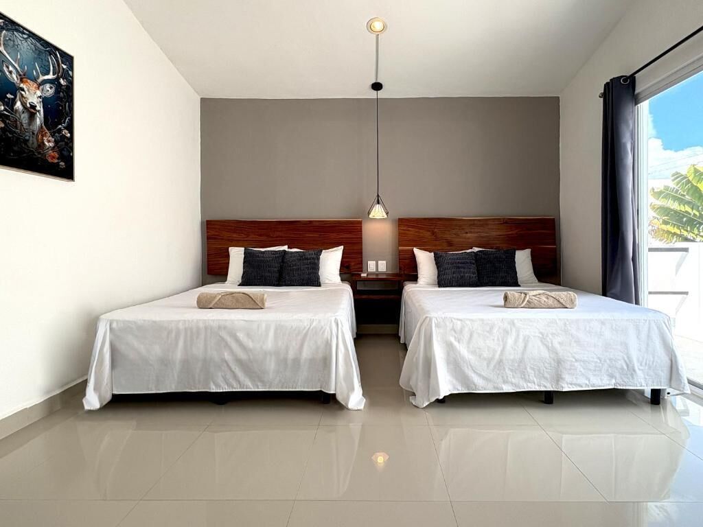 Habitación clásica doble, 2 camas de matrimonio | Escritorio, espacio para trabajar con un portátil, wifi gratis