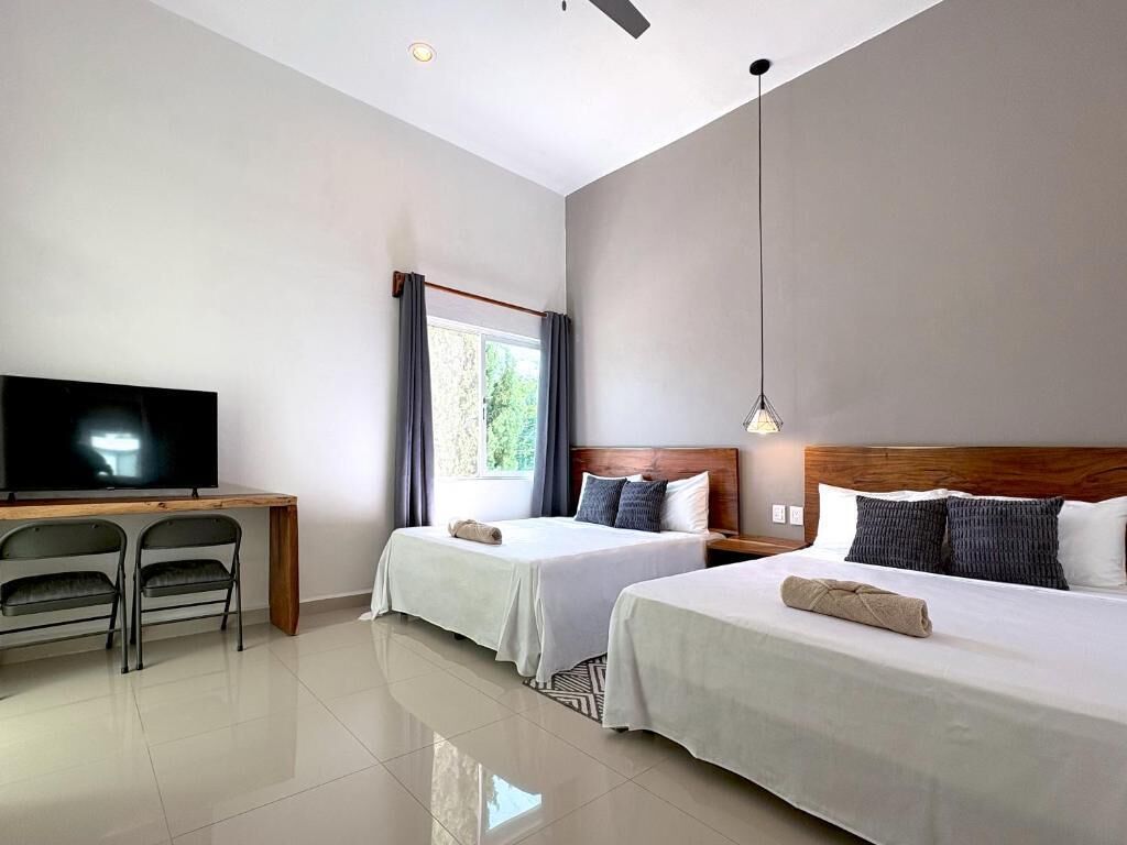 Habitación clásica doble, 2 camas de matrimonio | Escritorio, espacio para trabajar con un portátil, wifi gratis