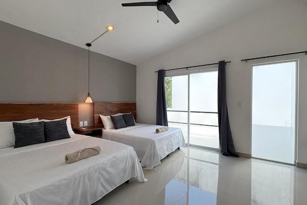 Basic Double Room, 2 Queen Beds | Desk, laptop workspace, free WiFi
