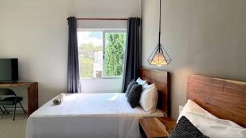 Habitación doble estándar, 2 camas Queen size | Escritorio, espacio para trabajar con laptop y wifi gratis