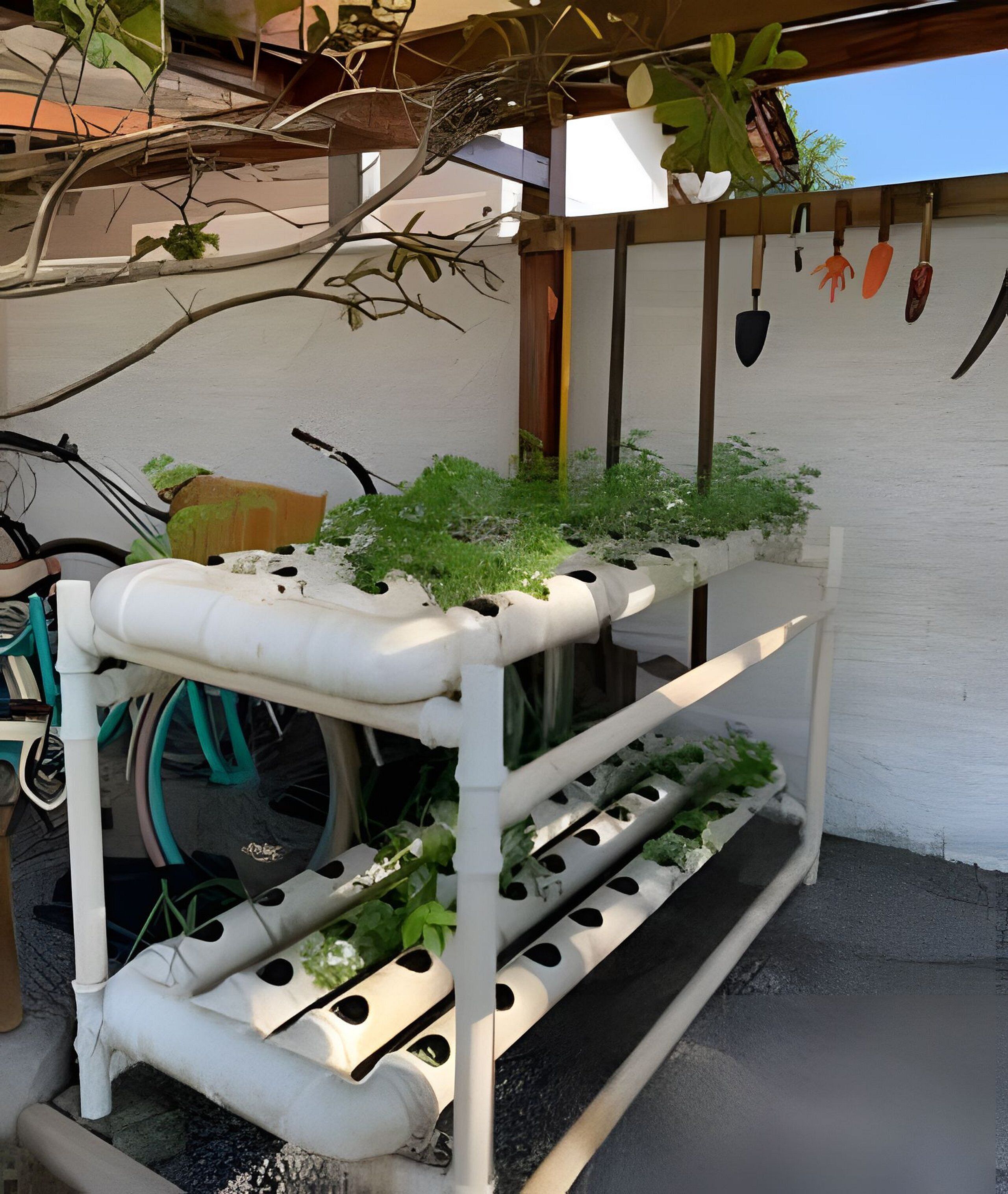 A vertical garden structure with multiple tiers for plants, a bicycle, and gardening tools against a wall.