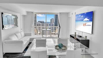 Apartamento superluxo, vista parcial para o oceano | Área de estar