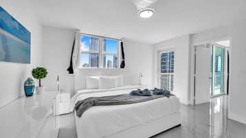 Luxury Apartment, Partial Ocean View | Desk, laptop workspace, free WiFi