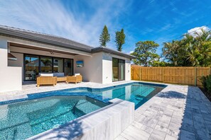 Outdoor pool, a heated pool - Luxury Beach House Outdoor Oasis Spa/Pool Heated (Naples)