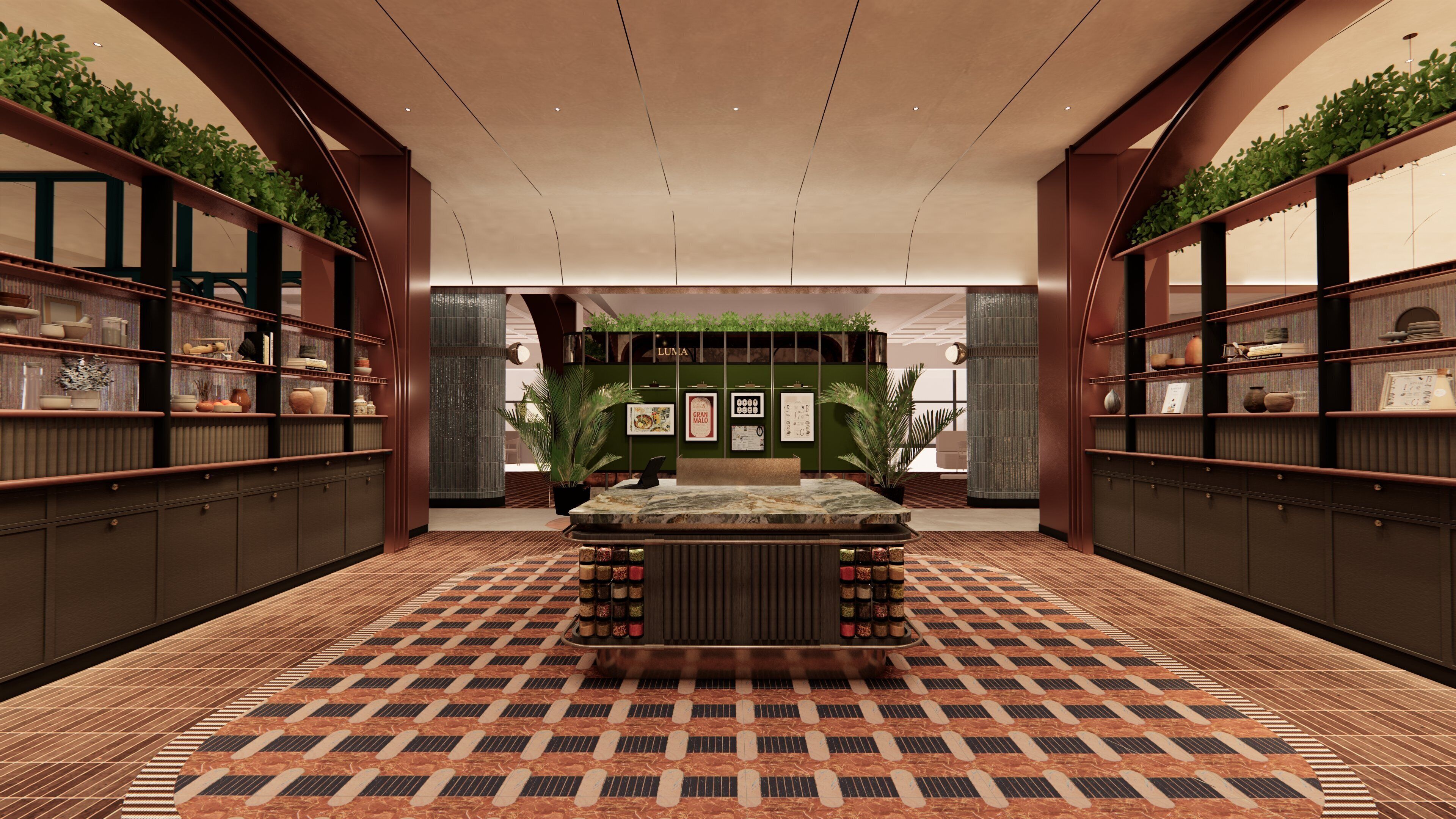 A hotel lobby with a central reception desk, green plants on shelves, framed pictures on the wall, and patterned flooring.