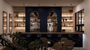 A modern bar area with a central archway, shelves with bottles, and seating in the foreground. - Holiday Inn Puerto Plata-Cofresi Bay Area By Ihg (Puerto Plata)