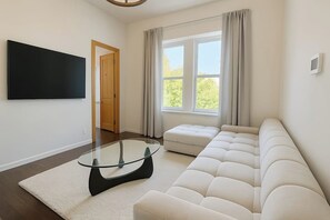 Living area - Sacred Winter Calm | Skyline Views, 15 Min to NYC (Jersey City)