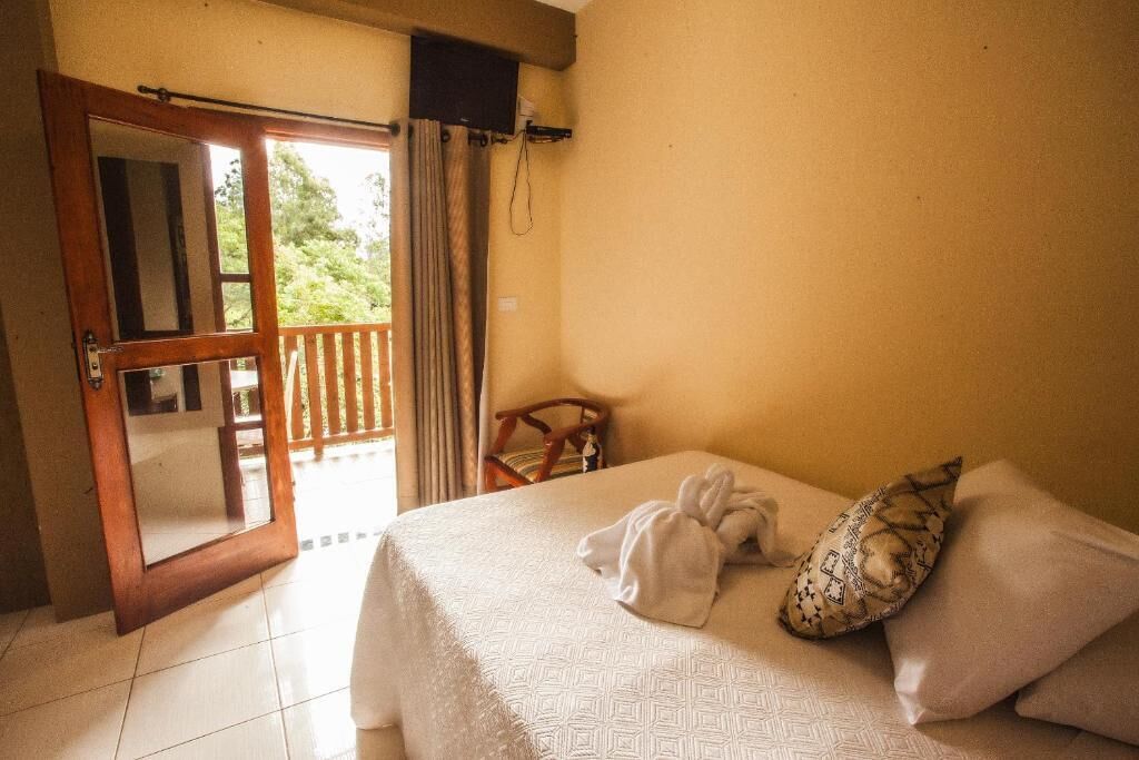 Suite – standard, balkong, hageutsikt | Individuelt dekorert og wi-fi (inkludert)