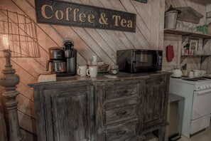 Fridge, microwave, stovetop, coffee/tea maker