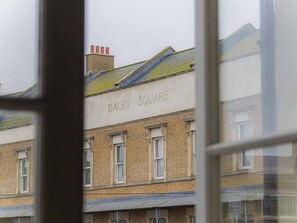 A building with the name "DALBY SQUARE" on its facade.