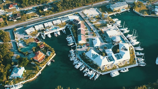 An aerial view of a marina with multiple docks and boats. - Three Bedroom Townhouse (Freeport)