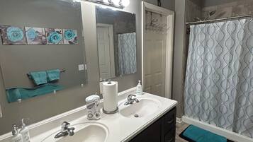 Shower, towels, toilet paper