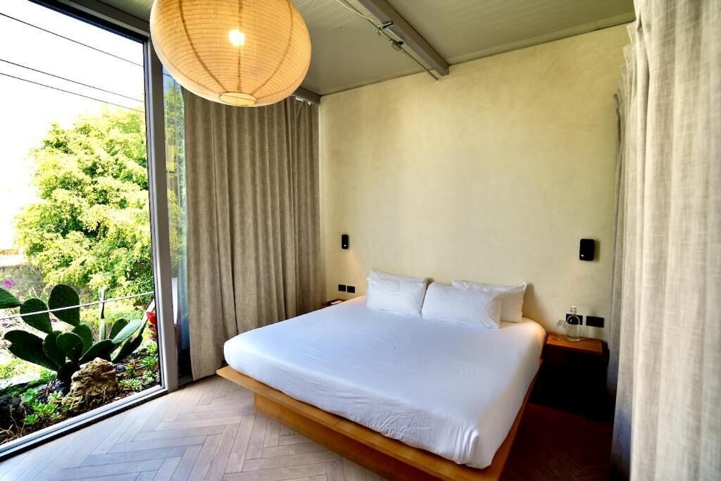 Double Room, City View | In-room safe, iron/ironing board, free WiFi