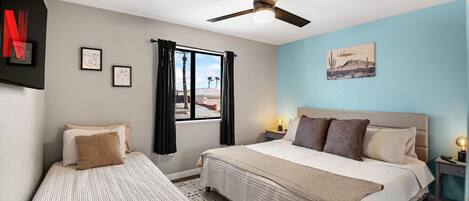 4 bedrooms, desk, iron/ironing board, travel cot