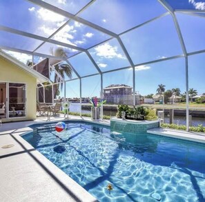 Outdoor pool, a heated pool - 400 Bald Eagle Drive, centrally located spacious home with a gorgeous pool area! (Marco Island)