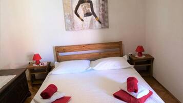 1 habitación, tabla de planchar con plancha, internet y ropa de cama