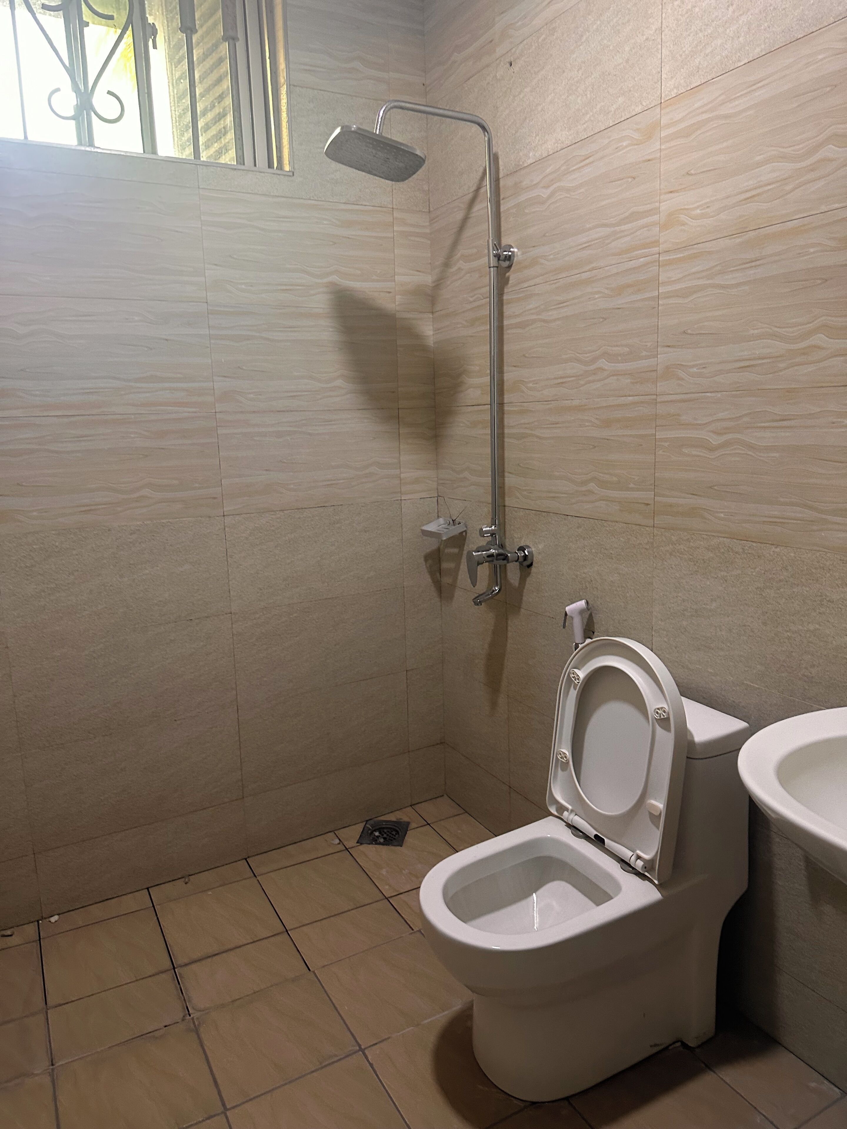 Shower, free toiletries, towels, soap