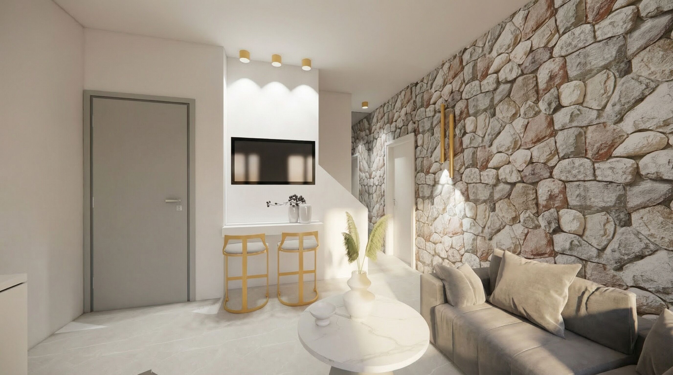 A modern living room with a stone wall, a sofa, a coffee table, and a kitchen area with a sink and stools.