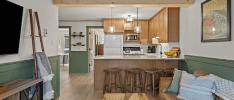 TV, fireplace, books