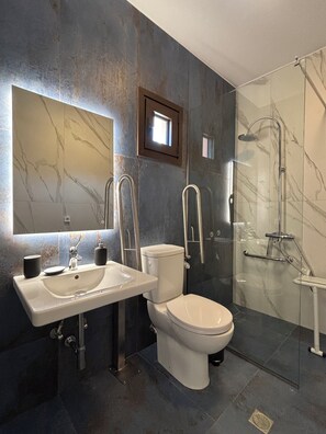 Shower, towels, soap, toilet paper