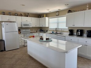 Fridge, microwave, oven, stovetop - 5 Bedroom canal house with pool (Ocean Isle Beach)