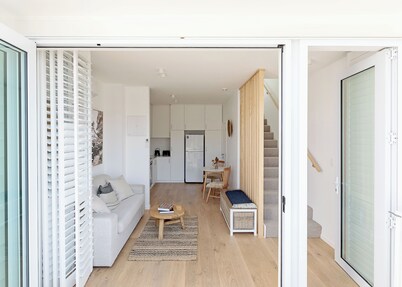 Stylish Sunny Matakana Townhouse Steps to Shops + Indoor-Outdoor Living.