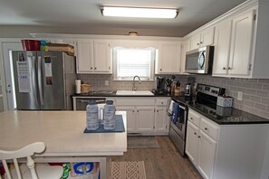 Fridge, microwave, oven, stovetop - Dog friendly 4 bedroom house, walking distance to beach (Ocean Isle Beach)