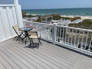 Outdoor dining - Oceanfront 6 bedroom duplex, shared pool (Ocean Isle Beach)