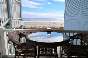 Outdoor dining - One bedroom oceanfront condo, private balcony, near pier (Ocean Isle Beach)