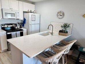 Coffee/tea maker, fridge, microwave, oven - One bedroom oceanfront condo, private balcony, near pier (Ocean Isle Beach)