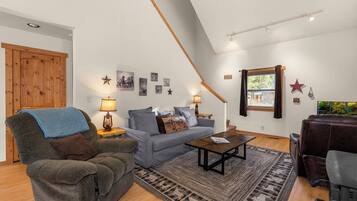 Smart TV, fireplace, books