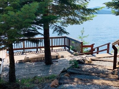 Serene Lake-Front Getaway with Private Dock and Decks for Fun and Relaxation