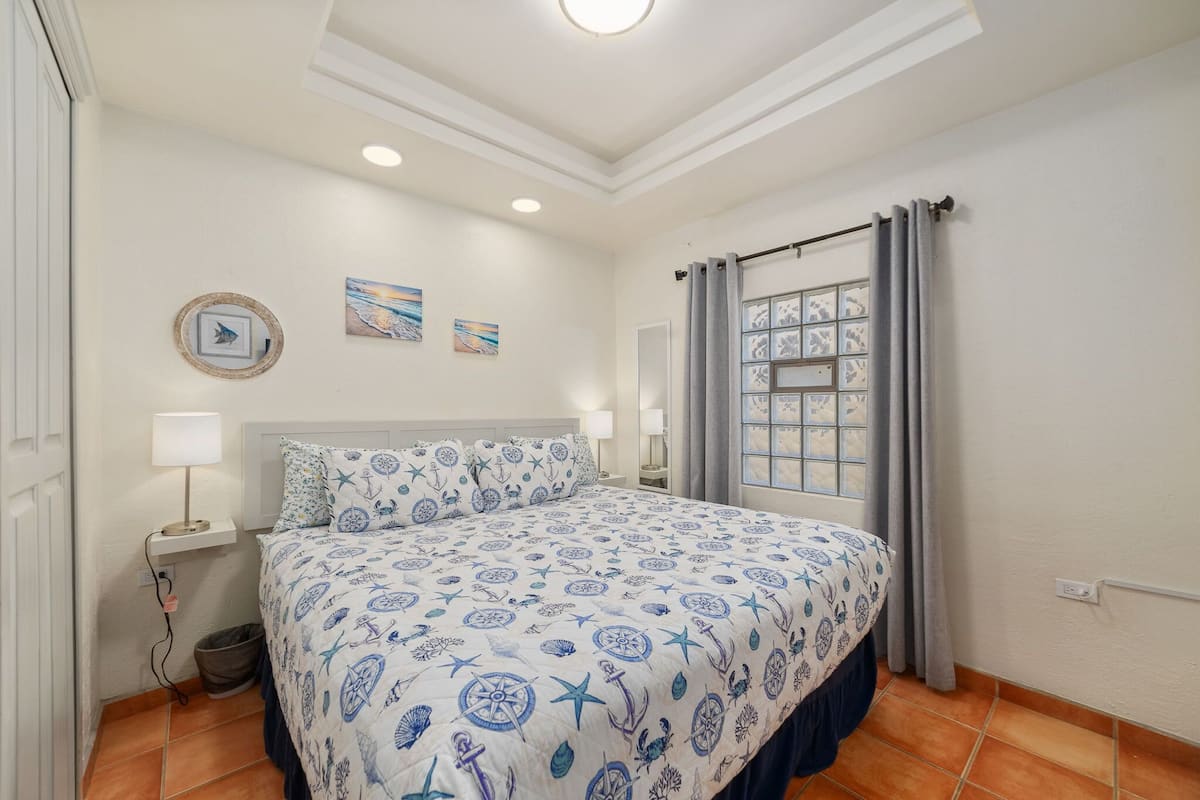 Casa familiar, vistas al mar | Caja fuerte, cortinas opacas, sistema de insonorización