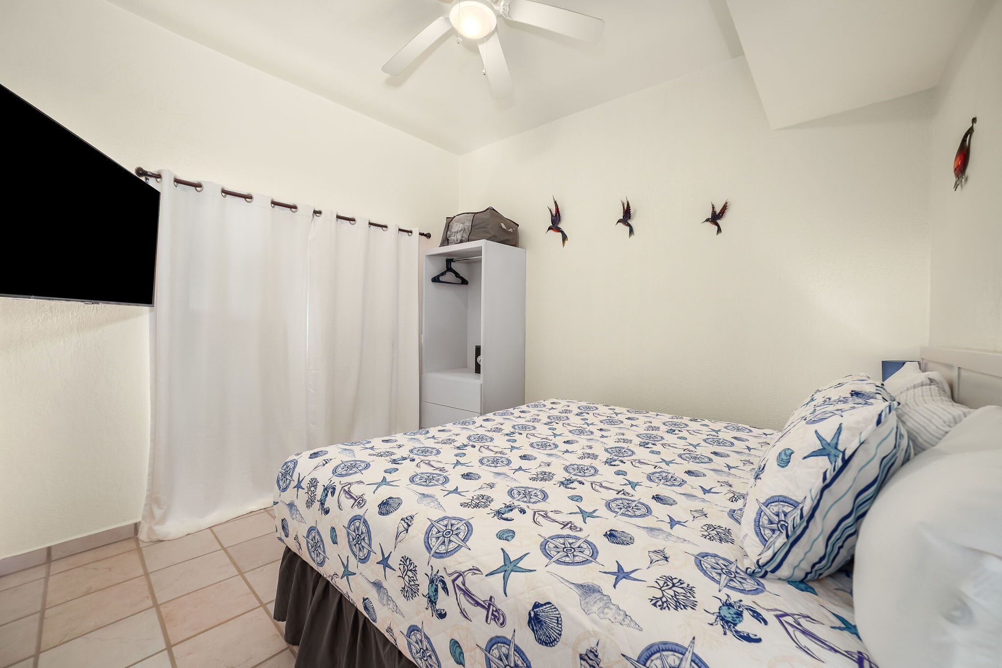 Casa familiar, vistas a la playa | Caja fuerte, cortinas opacas, sistema de insonorización