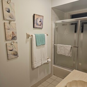 Shower, hair dryer, towels, soap