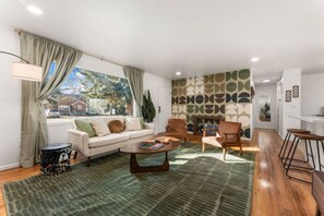 TV, fireplace - The Aspen is a mid-century modern upstairs unit. (Boise)