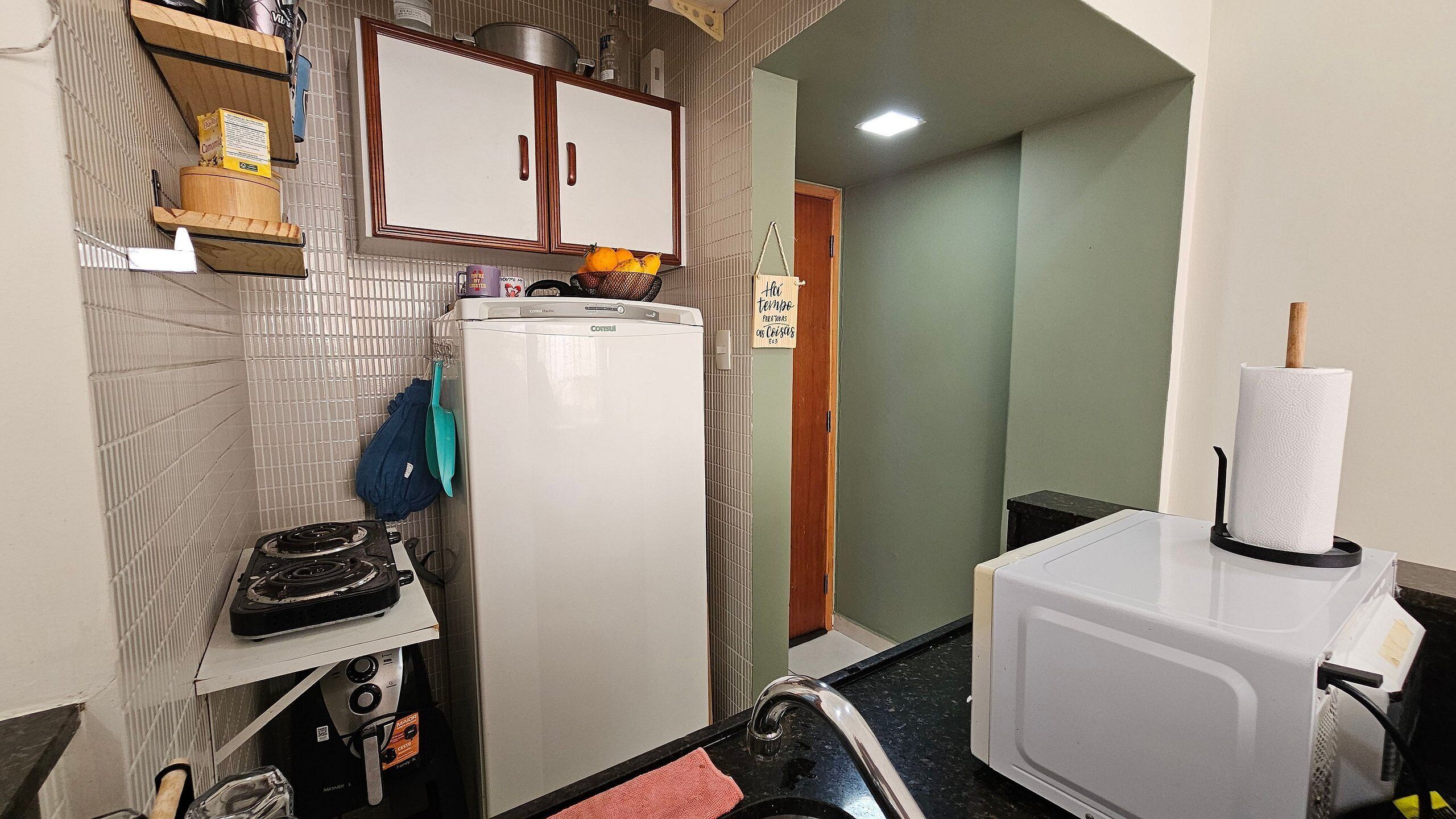 Fridge, microwave, coffee/tea maker, cookware/dishes/utensils