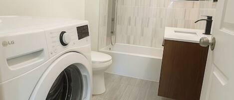 Hair dryer, towels, soap, toilet paper