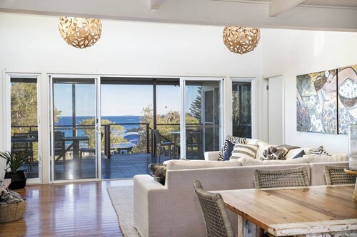 Classic Aussie beach house with amazing views and pet friendly garden.