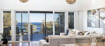 Classic Aussie beach house with amazing views and pet friendly garden.