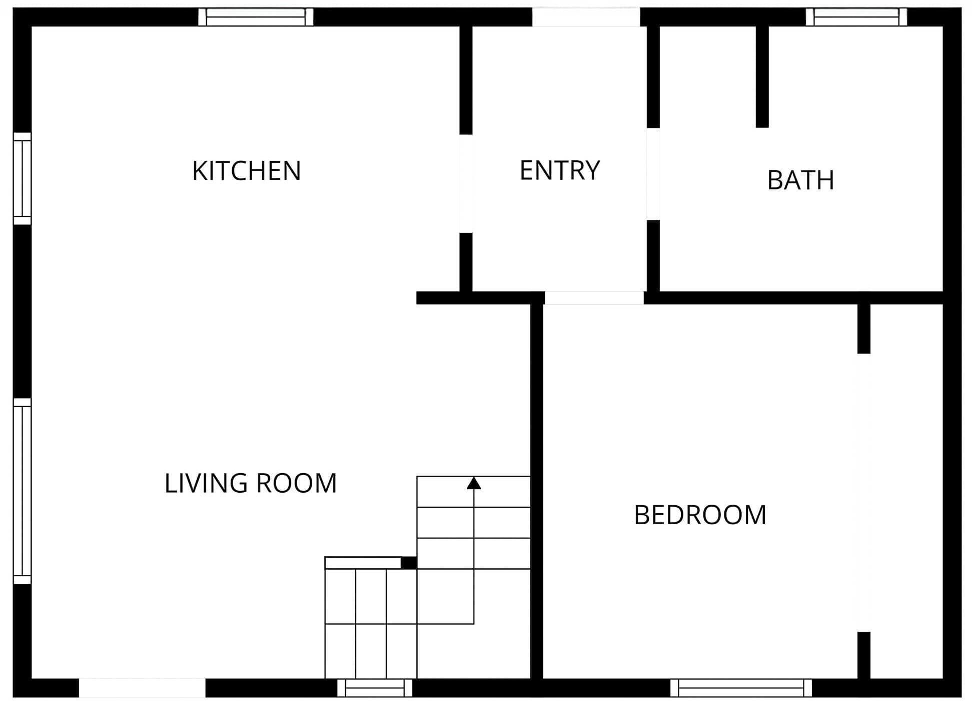 Ein Grundriss mit Küche, Eingangsbereich, Bad, Wohnzimmer und Schlafzimmer.