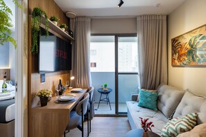 Apartment | Living room | 55-inch Smart TV with digital channels - Moderno com AC piscina e academia (São Paulo)