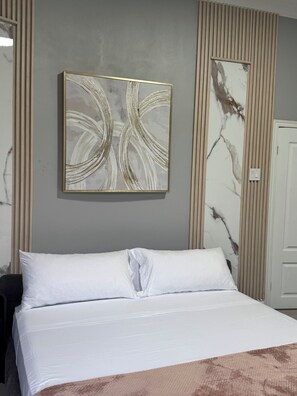 2 chambres, fer et planche à repasser, Wi-Fi, draps fournis